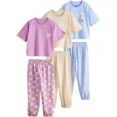 Next Pijama azul / amarillo / rosa