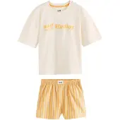 Self. Pijama beige / naranja / negro / blanco