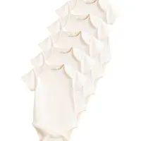 Next Pijama entero/body crema