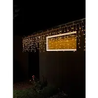 Konstsmide - Cortina de luces LED "Eisregen", con globos blancos, 200 diodos ámbar, transformador exterior de 24V, cable transparente.- 3672-803