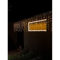 Konstsmide Cortina de luces LED "Eisregen", con globos blancos, 400 diodos ámbar, 24V, para uso exterior (IP44), con cable transparente