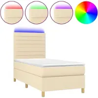Syfax Cama box spring colchón y luces LED tela crema 90x200 cm