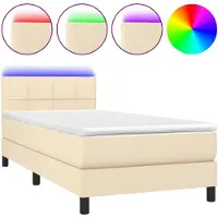 Syfax Cama box spring colchón y luces LED tela crema 90x200 cm