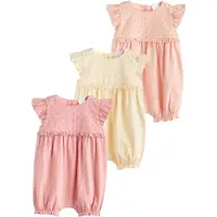 Next Pijama entero/body amarillo pastel / albaricique / rosa