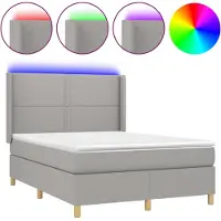 Syfax Cama box spring colchón y luces LED tela gris claro 140x190 cm