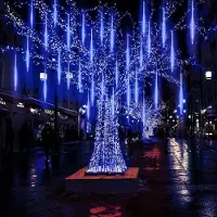 ROSNEK Cadena de luces LED con 192 luces tipo "lluvia de meteoritos", resistente al agua, ideal para Navidad, con forma de estacas de hielo, color azul
