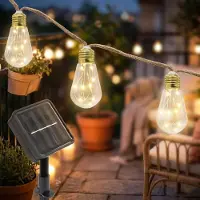 Spetebo Guirnalda de luces solares LED con 16 bombillas, de 540 cm de largo, color blanco cálido, para decoración de jardín. Incluye lámparas transparentes conectadas a un cordel natural