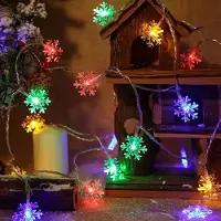 Lapamax Guirnalda de luces con forma de copos de nieve, de colores, para interior, con batería, marca 3M, 20 LEDs. Ideal para decorar ventanas, jardines, fiestas, Navidad