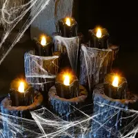 Unyqoos Uniqoos: Juego de 12 velas LED negras, con efecto de llama parpadeante, alimentadas por batería, de plástico, para uso en interiores y exteriores, ideales para decoración de Halloween