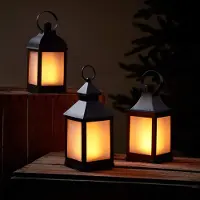 Unyqoos Uniqoos: Juego de 3 faroles LED resistentes a la intemperie con efecto llama, temporizador de 6 horas, 21 LEDs ámbar, funcionan con pilas, altura 25 cm x ancho 10 cm