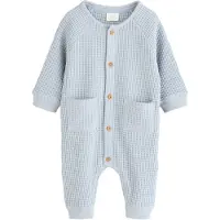 Next Pijama entero/body azul claro