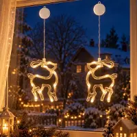 Lapamax Kit de dos guirnaldas de luces LED para ventanas, con ganchos adhesivos, alimentadas por batería, decoración navideña, ideal para fiestas y celebraciones. Diseño de renos
